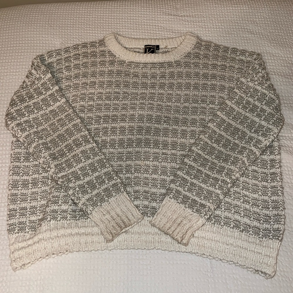 Gray and white sweater